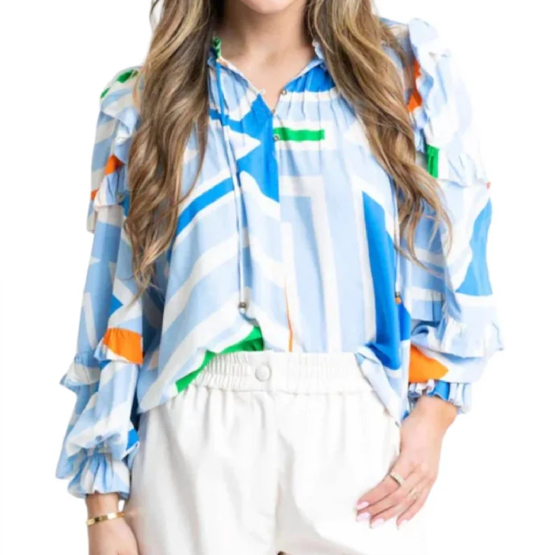 Geometric Ruffle Top In Blue Boutique Styles